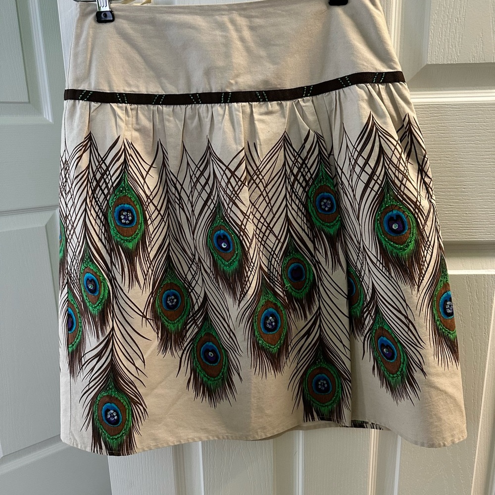 Peacocks will be jealous when they see you wearing their design!